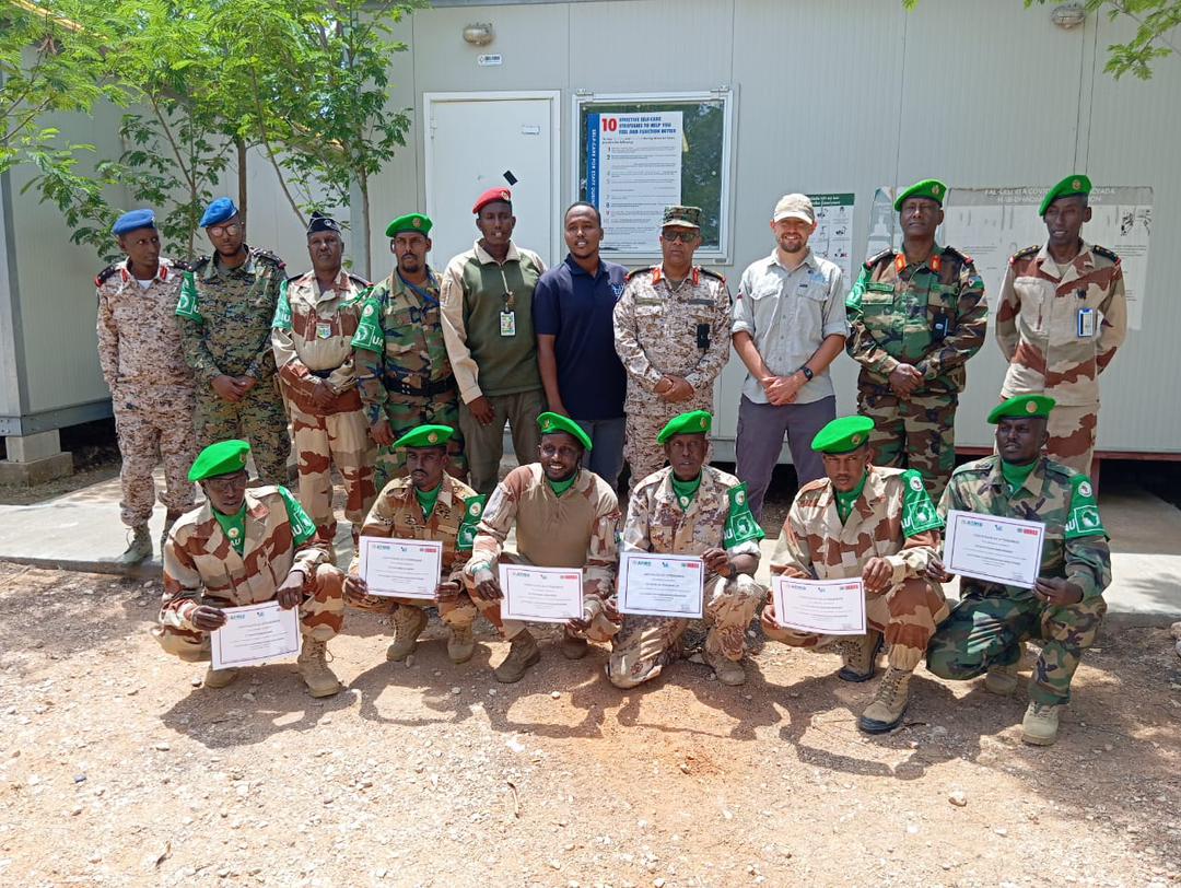 ATMIS_Somalia's tweet photo. On Tuesday, 6 #ATMIS #DNDF troops completed a three-day Electronic Counter Terrorism Course (ECC) training organised by @UNMAS at Sector Four HQs in Beletweyne, Hirshabelle State.
The specialised training enhances the troops’ peacekeeping capabilities, bolstering efforts to protect civilians from IED threats and maintain security in the region.
At the closing ceremony, ATMIS Sector Four Commander, Col. Said Waberi Harour urged the troops to apply their newly acquired skills in operations to mitigate the impact of hazardous devices. #ATMISInTheSectors