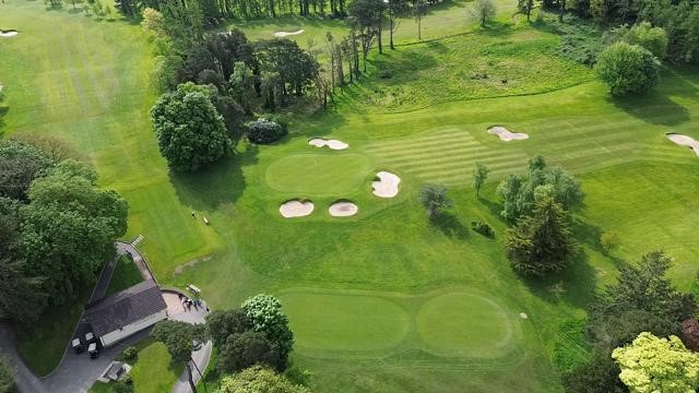 View from above the Clubhouse taking in the putting greens, 18th green, 1st tee, practice area and Pro Shop 😀💚