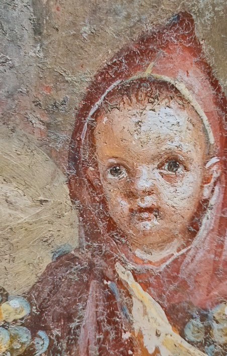 This is not a Pre-Raphaelite painting, but a seismic new Roman fresco discovery from Pompeii. The wall fresco uncovered in the 'House of the Painters at Work' shows a cherubic young child wearing a hooded cloak, sat among bounteous bunches of grapes and accompanied by their