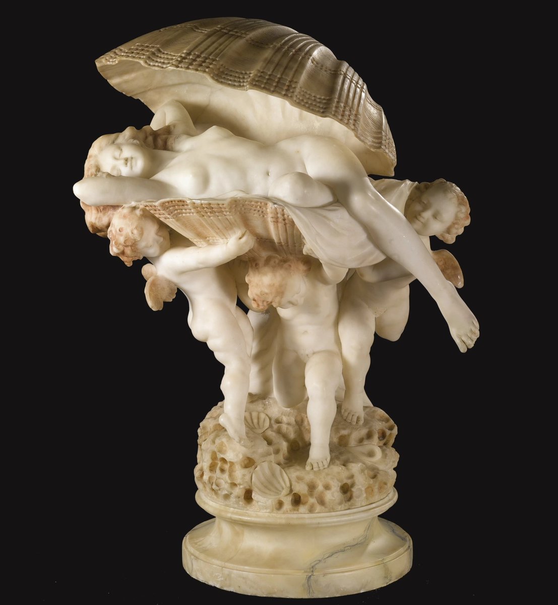 The birth of Venus, an Italian carved and tinted carved Carrara marble table lamp Florence, late 19th/early 20th century