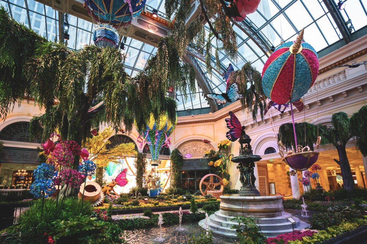 Bellagio's tweet photo. Embracing the enchantment of summer within our Conservatory's "Higher Love", where the extraordinary awaits just around every corner. https://t.co/Ehk0MpUUca
