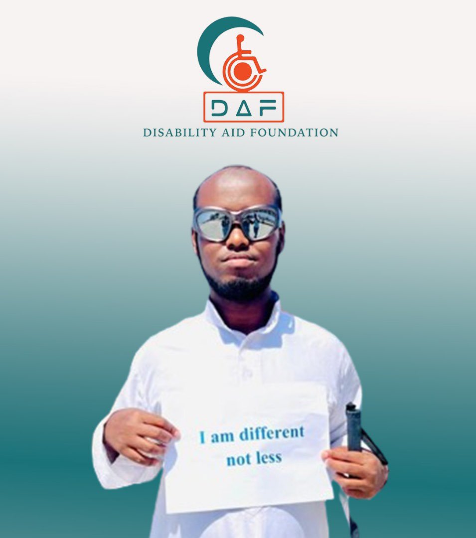 Meet Mohamed Mukhtar, a remarkable university student who, despite being totally blind, embraces life with enthusiasm and determination. 

Here he is at the beach, holding a piece of paper with a powerful message: 'I AM DIFFERENT, NOT LESS.'

Mohamed's story is a testament to the