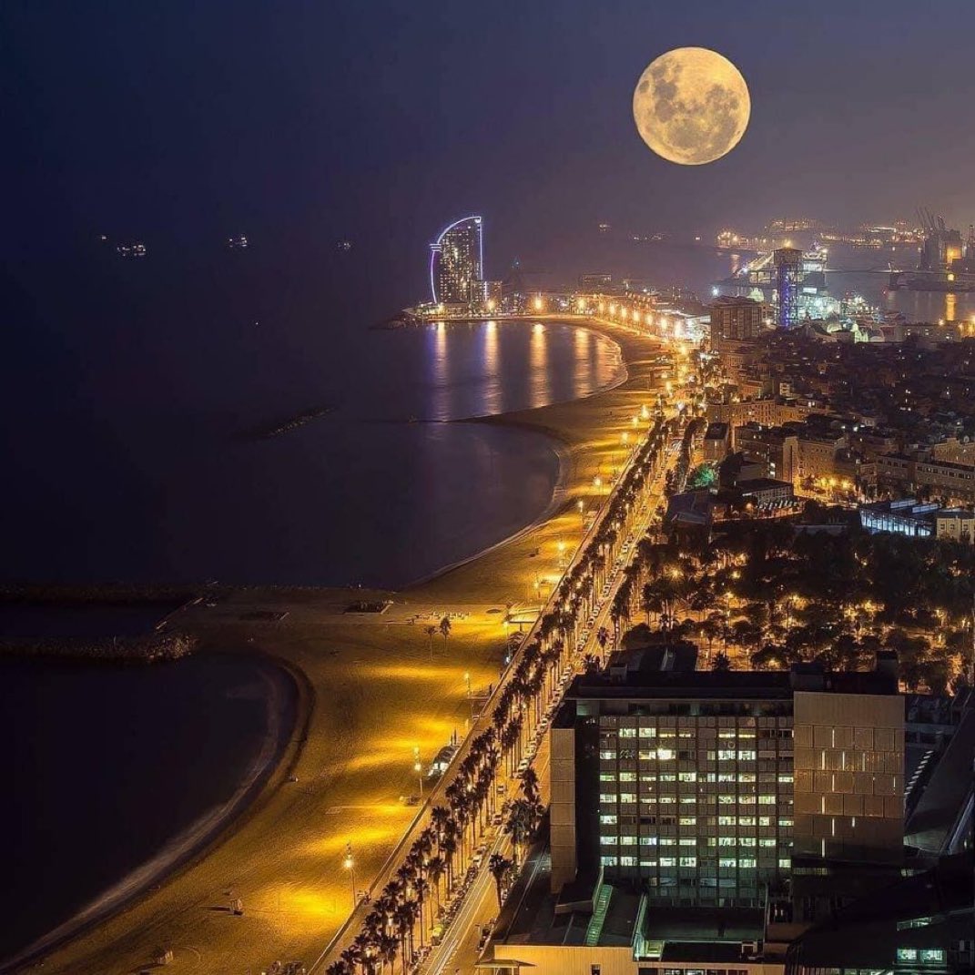 Full Moon over Barcelona, Spain.