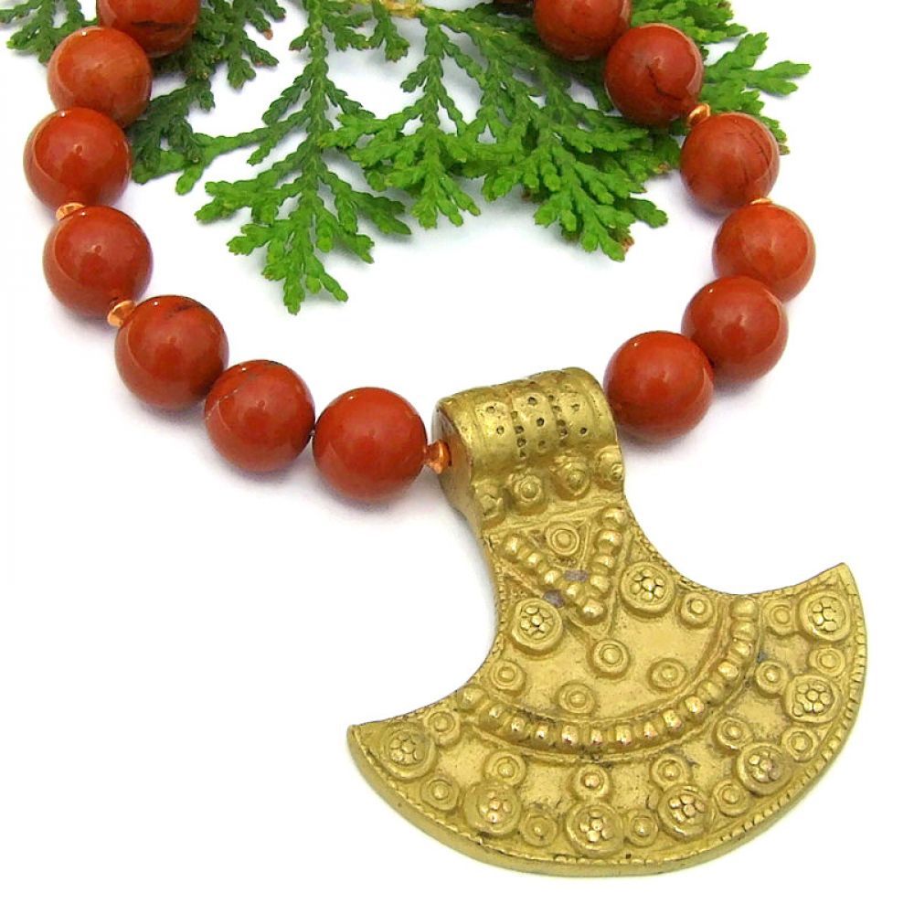 Perfect gift for the woman who loves ancient protection symbolism: traditional artisan Nepalese brass shield pendant necklace w/ earthy red jasper! bit.ly/ProtectionSD via @ShadowDogDesign #ejwtt #ShopSmall #ShieldNecklace