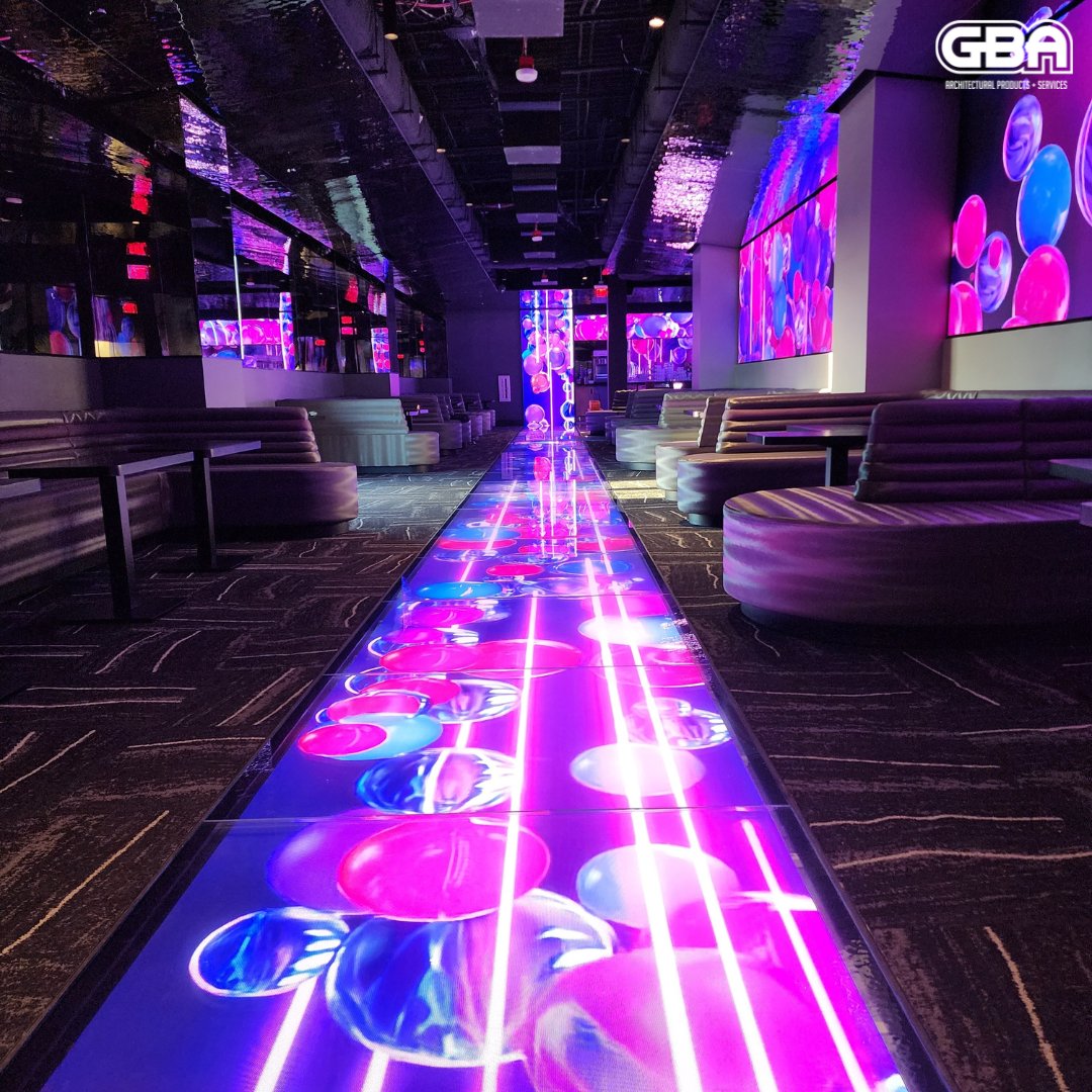 Step into the futuristic realm of Atomic Golf's 'Cosmic Lounge'. Our team at GBA has designed a custom glass floor system integrated with an LED light box, creating mesmerizing immersive floors. Experience golf like never before. ⛳ 
#glassfloor #LEDglassfloor