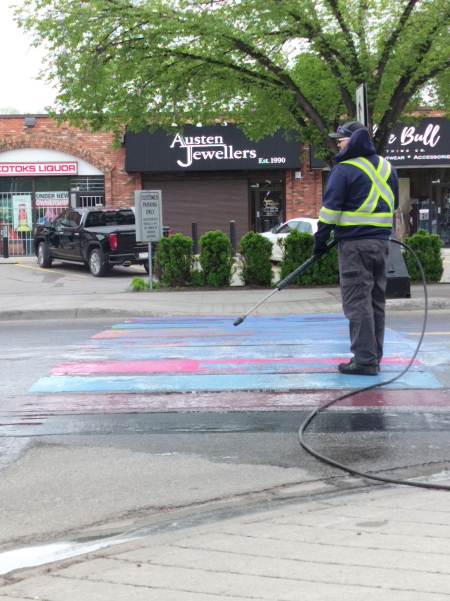 Okotoks' Pride crosswalk was vandalized with blue paint last night, to no one's surprise. Same thing happened last year.

This is exactly why we need to show up and show support at rural Pride events.