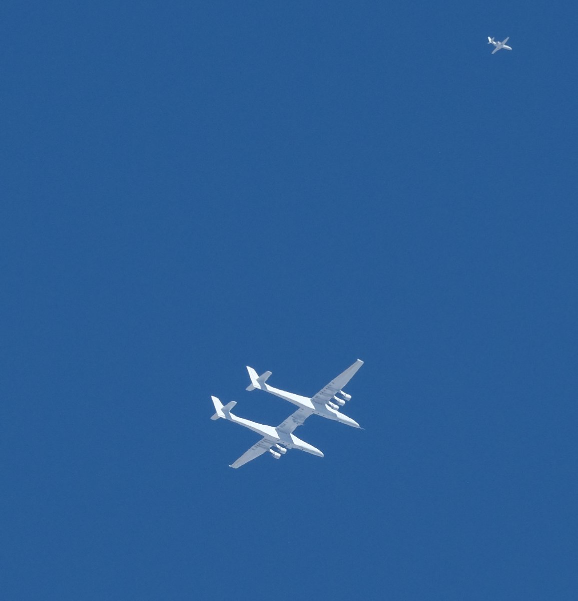 Scaled Composites Stratolaunch N351SL operating as ROCC01 at about 30,000' AMSL near Lone Pine, California this morning (with an escort that I wasn't receivng ADS-B from).