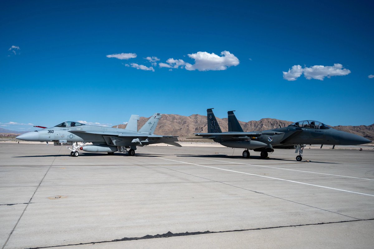 Couple trouble! An F/A-18E alongside an F-15EXat Nellis AFB during Black Flag 24-1 (April 24, 2024). It seems the two #Boeing birds don't like each other.