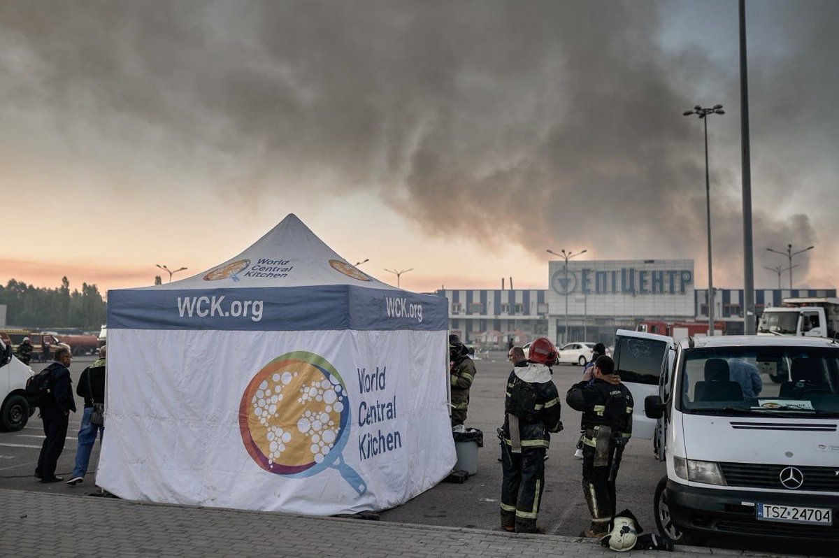 WCKitchen's tweet photo. WCK’s team in Kharkiv was at the site of Saturday's attack on a hardware store within hours of the blast. The store was full of shoppers when the bomb hit, killing at least 19 people and injuring dozens more. We were at the site for five days, providing hundreds of meals as rescuers searched the area. #ChefsForUkraine