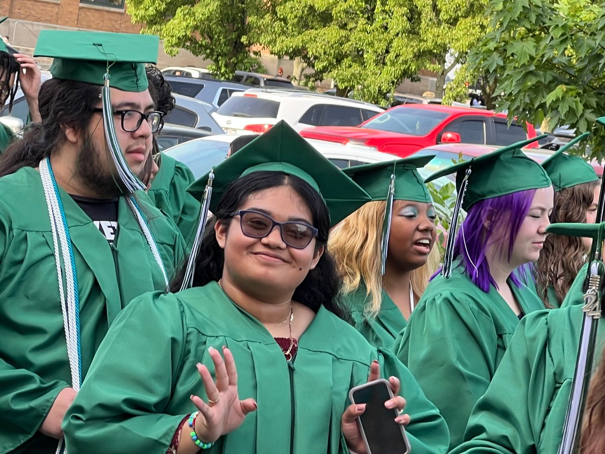 FWCommSchools's tweet photo. #IvyDay is a #SouthSide High School tradition that goes back many generations. Students wear their caps and gowns and parade down the streets surrounding the school as family, friends and neighbors cheer from the sidewalks. The Ivy Day Queen is crowned following the parade. https://t.co/1OSd6BkITF