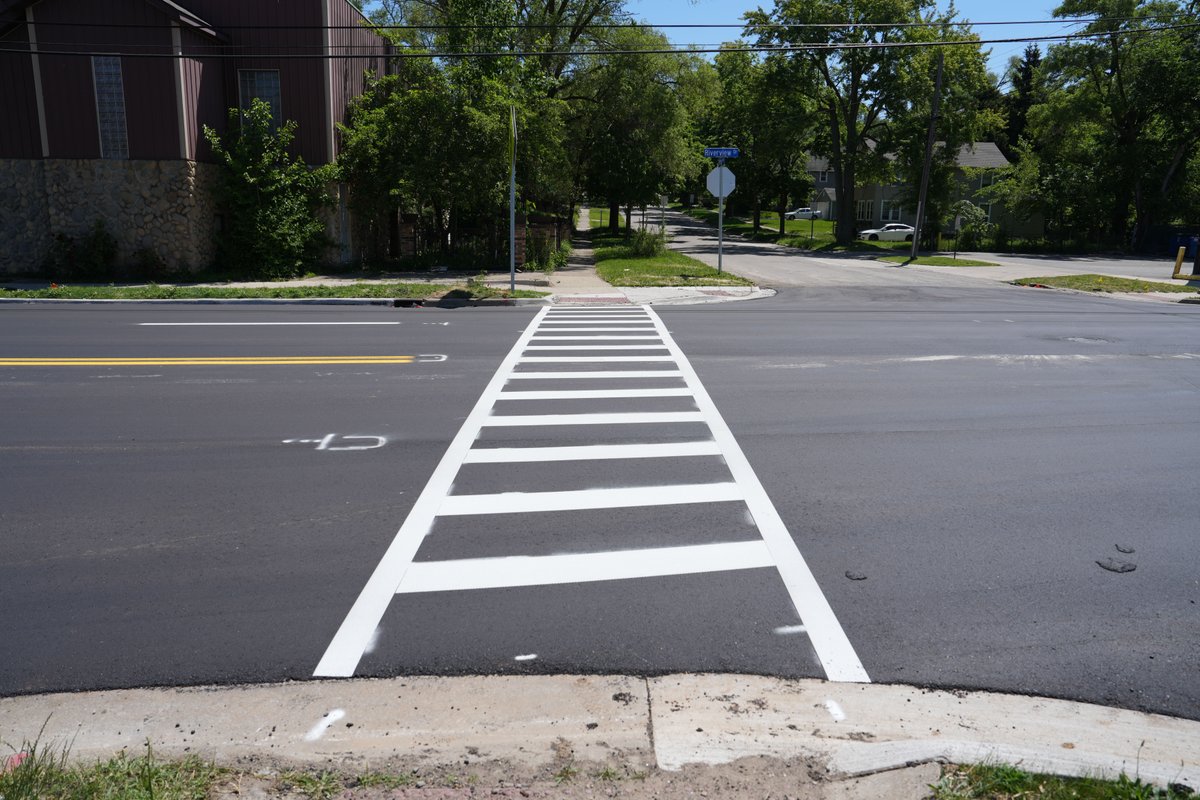 Great news! Riverview Dr is now fully open with all lanes accessible. A few finishing touches are still underway, but we've completed the paving, enhanced the sidewalks, added ADA ramps, and updated the signage and pavement markings at Hotop.