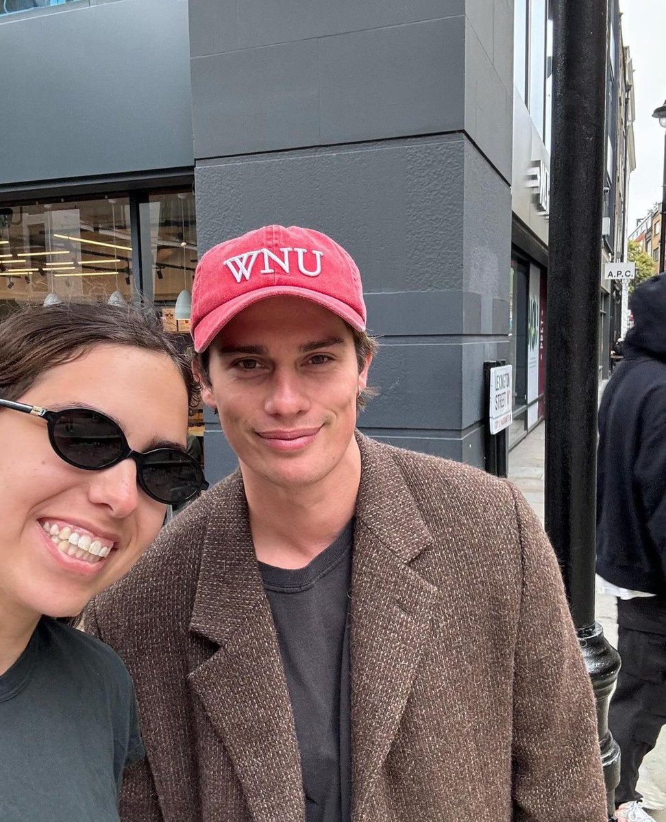 Nicholas with a fan in London recently.

via: hannahgmccain on instagram