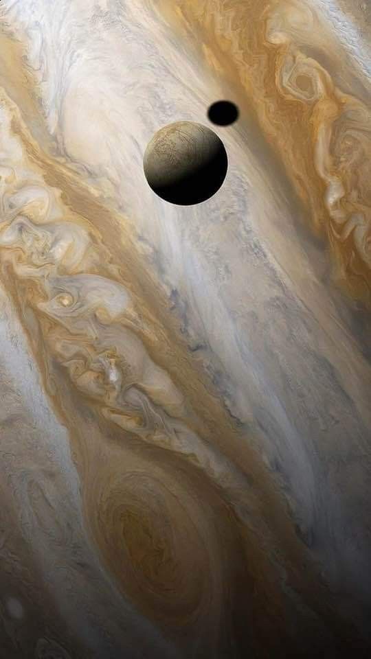 #PPOD: The shadow is not that of Europa but a second moon (Io), which is not in this frame. Europa is slightly smaller than Earth's Moon and is tidally locked, so the same side always faces Jupiter. Credit: @NASA @NASAJPL @Caltech @kevinmgill