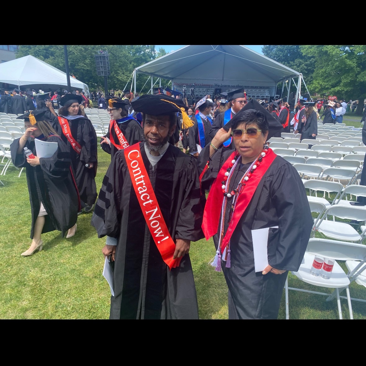 Congratulations to the class of 2024! 

[Students, faculty, staff at QC CUNY’s commencement wear sashes with messages like “Open the gates,” “Don’t fire professors,” and “Contract now!”]

#AgainstAusterity #CareNotCuts #FixCUNY #FundCUNY #InvestInCUNY #APeoplesCUNY #Red4HigherEd
