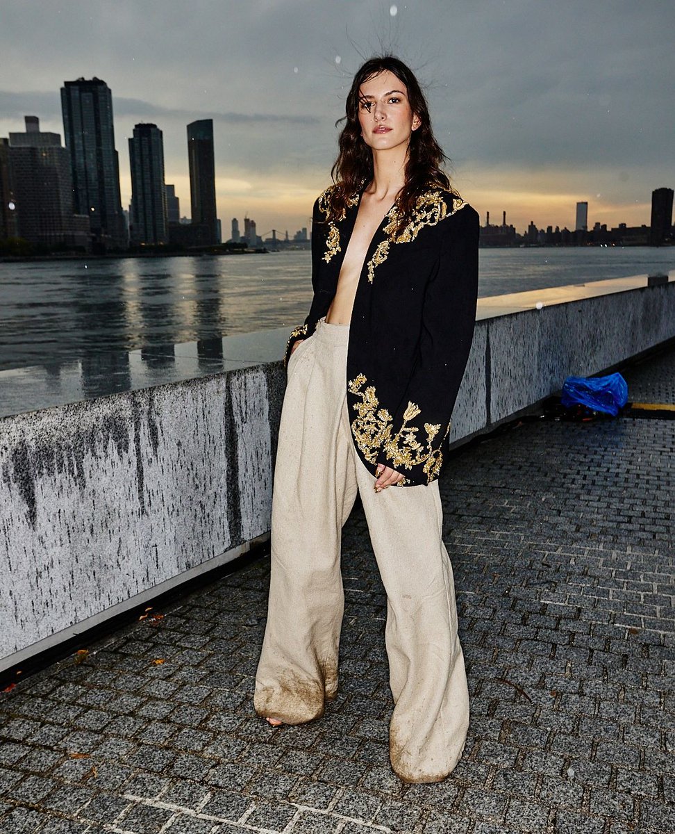 Golden Edge⁠ ⁠ Black Oversized Sherwani Jacket with Gold Hand Embroidered Filigree Crystal and Bugle Beaded Fringe with Sand Linen Wide Leg Pant from the Spring Summer 2024 collection⁠ ⁠ Photo by @sonnyphotos