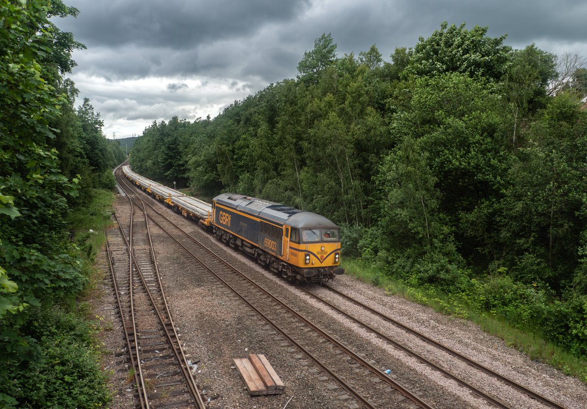 GBRf 69003 ex Romanian built 56018. The piles of candle wax have been removed. If you know you know 😉 7M18 0720 Doncaster Up Decoy to Toton North Yard, at a very overgrown Treeton junction 29/05/24.