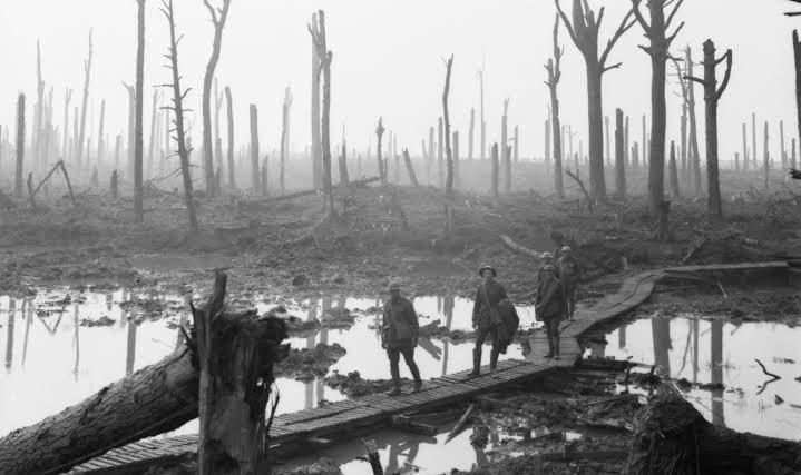 CraigShields72's tweet photo. @HardcoreHistory An incredible photo. 

I’ve posted another from the third Battle of Ypres (or Passchendaele). 

This shows Australian soldiers on duck boards and is bitter sweet for me. 

This photo was taken a mile away and on the same day my great, great Uncle was killed. https://t.co/pJwGaij6MI