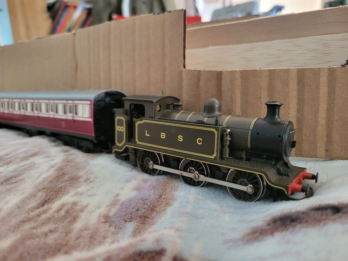 Here's a project that's dead in the water for now. A OO scale SS Baychimo it's sort of a test for the feasibly possible to make large oo ships. E2 and Coaches for size comparison. Baychimo photo below-