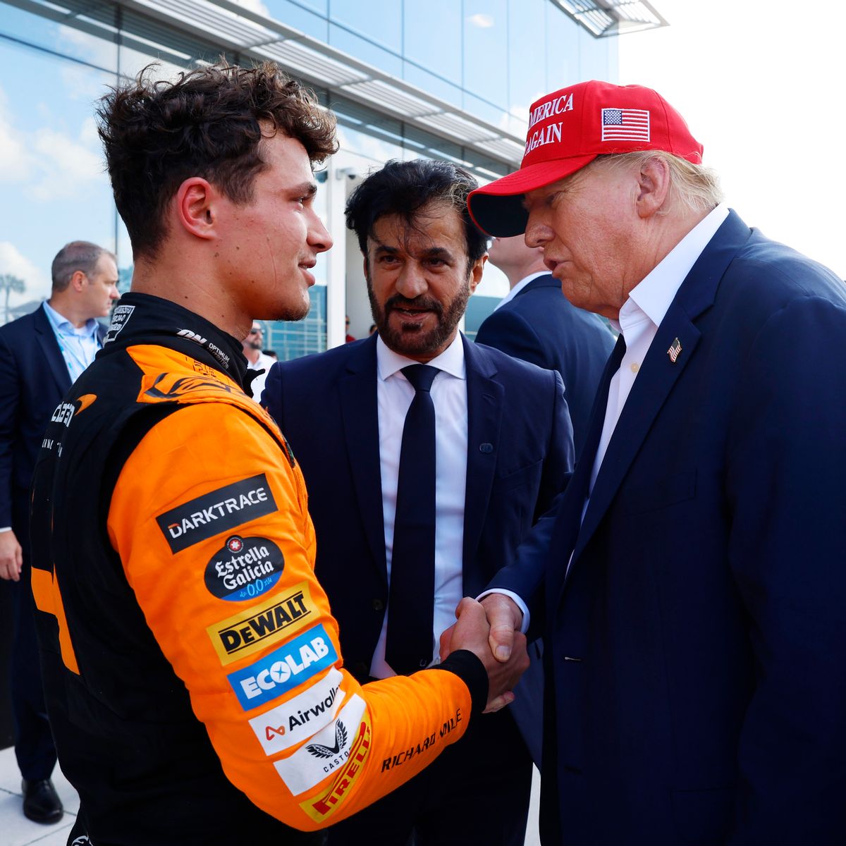 34 time convicted felon Donald Trump shakes hands with future WDC Lando Norris