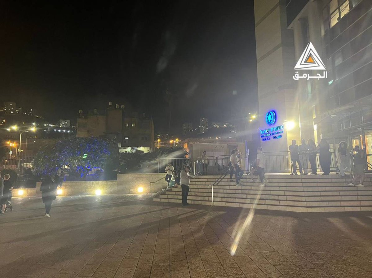 Palestinians demonstrate in front of the occupation police headquarters in the city of Haifa after the arrest of a number of young men demanding an end to Israel's war against Palestinians