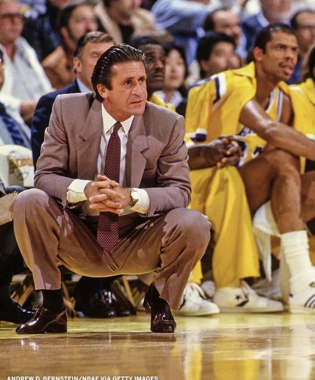 NBA coaches should wear suits again. The team issued polo shirt or fleece era sucks. Bring style back to the NBA
