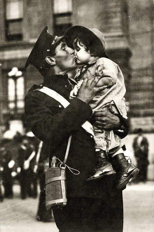 A Canadian Expeditionary Force soldier kisses his daughter goodbye before shipping off to WWI. Quebec, 1914.