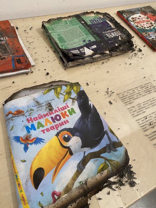 eurovanya's tweet photo. some of 50,000 books that were burned in Kharkiv attack that killed 7 workers were presented, including children’s books.

Destroying Ukrainian culture is one of russia’s priorities. https://t.co/RPjCVzoLxS