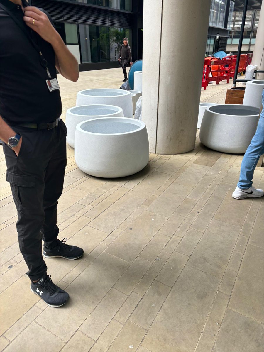 Once again <a href="/CamdenCouncil/">Camden Council</a> is NOW forcibly 'removing' those experiencing homelessness under the pretence of building works outside their Pancras Square offices... some convenient new planters!
There has been one arrest so far... 
How is this helping?
(1)