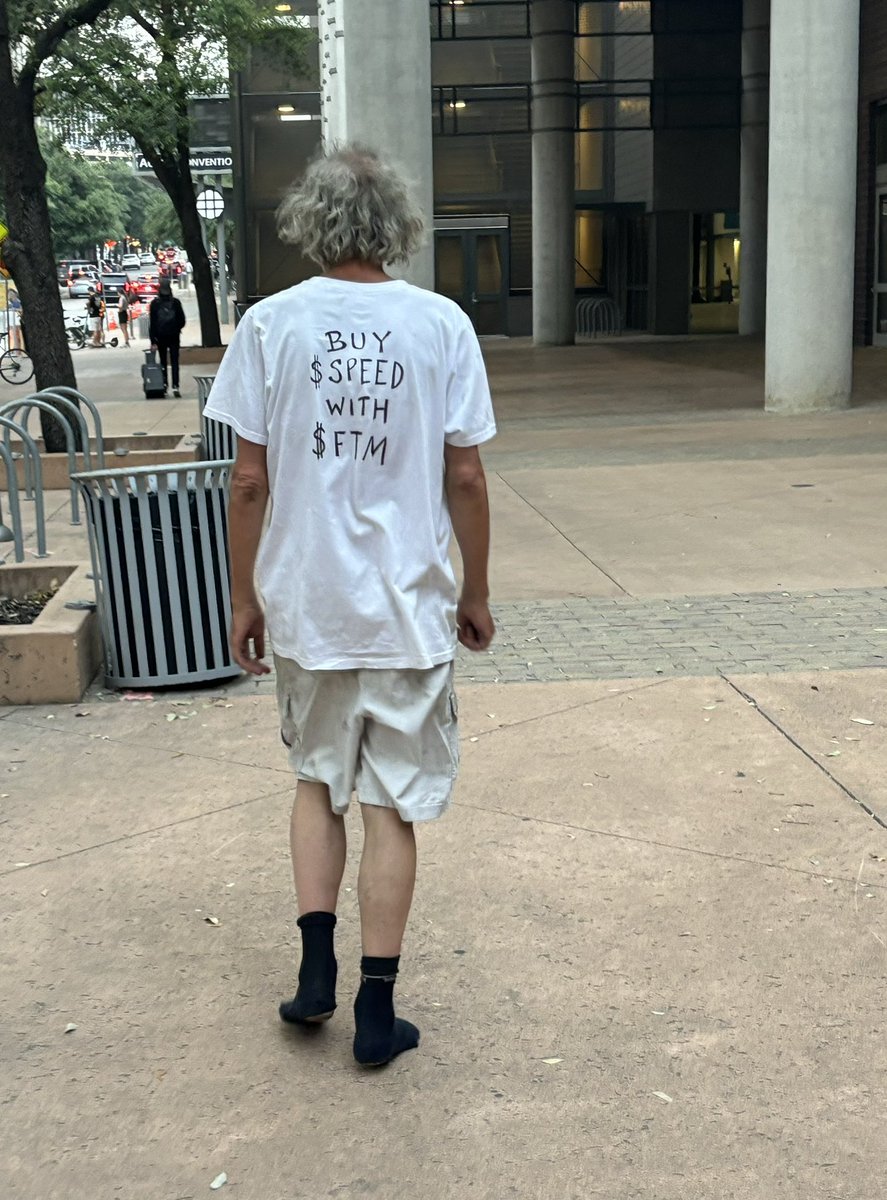 I stopped this guy and asked if $speed was a memecoin. He literally had zero clue about what I was referring to.. 

So, someone gave him the shirt, knowing he’ll wear it throughout the conference week, because it’s clean, and comfortable. He’s completely oblivious to the subtext