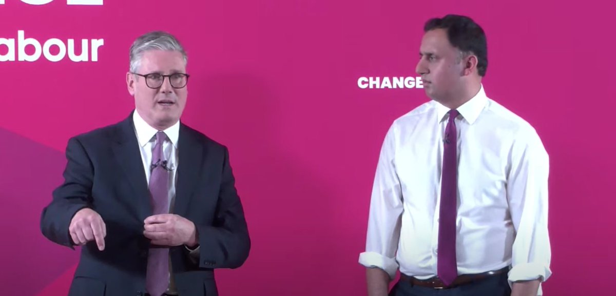 Scottish Labour leader Anas Sarwar not managing to hide his disappointment that no one told him Starmer wasn't actually going to be doing the jacket-off, sleeves-rolled-up thing this time.