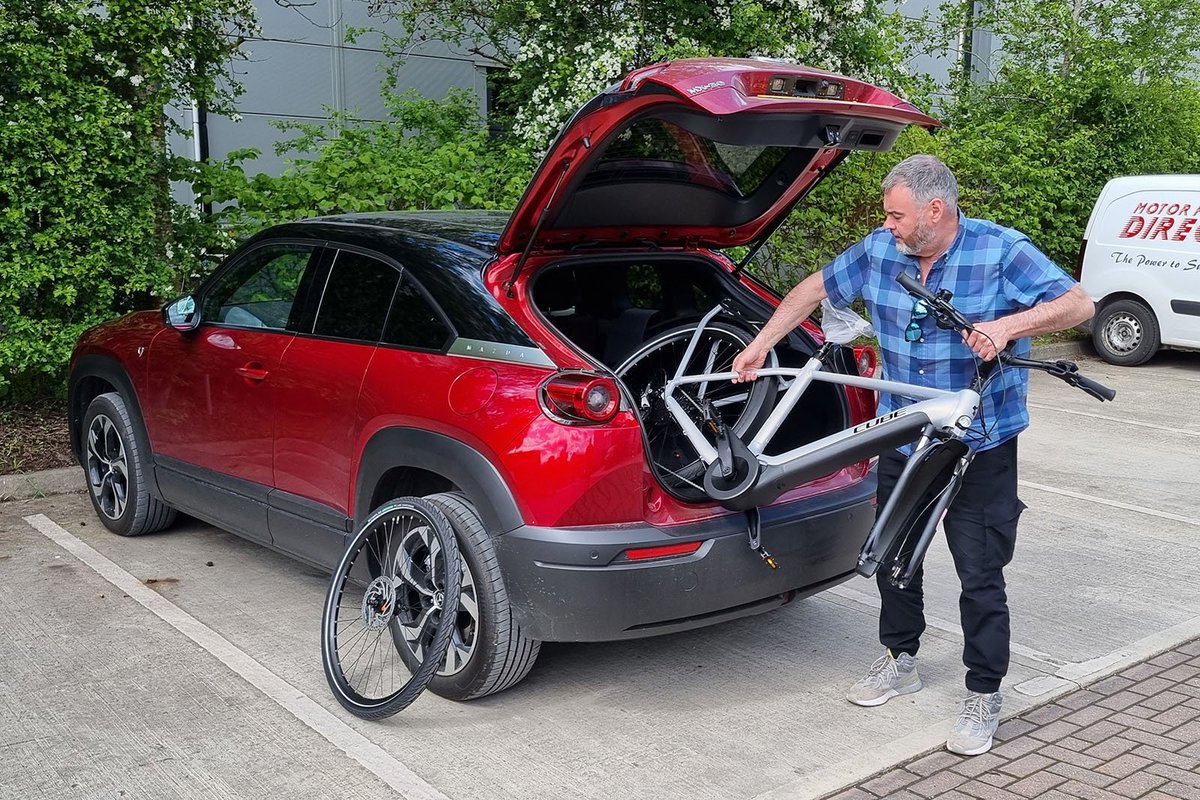 Our managing editor was hoping that one green vehicle could become transport for another – but does his new e-bike actually fit into the boot of the Mazda MX-30 R-EV? 🤔 buff.ly/3QawlUV