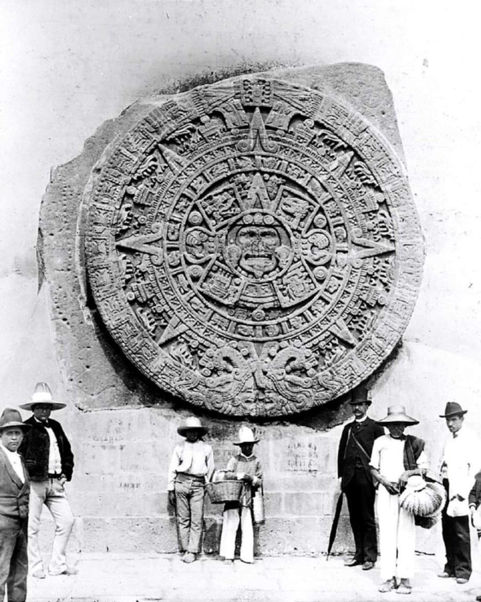 The Aztec Sun Stone, 1886 AD. Aztec Sun Stone or Calendar Stone, a large basalt sculpture from late 15th Century AD, depicting the sun god Tonatiuh at its center. It represents Aztec cosmology with symbols of previous eras and calendar systems. Discovered in 1790, it is now