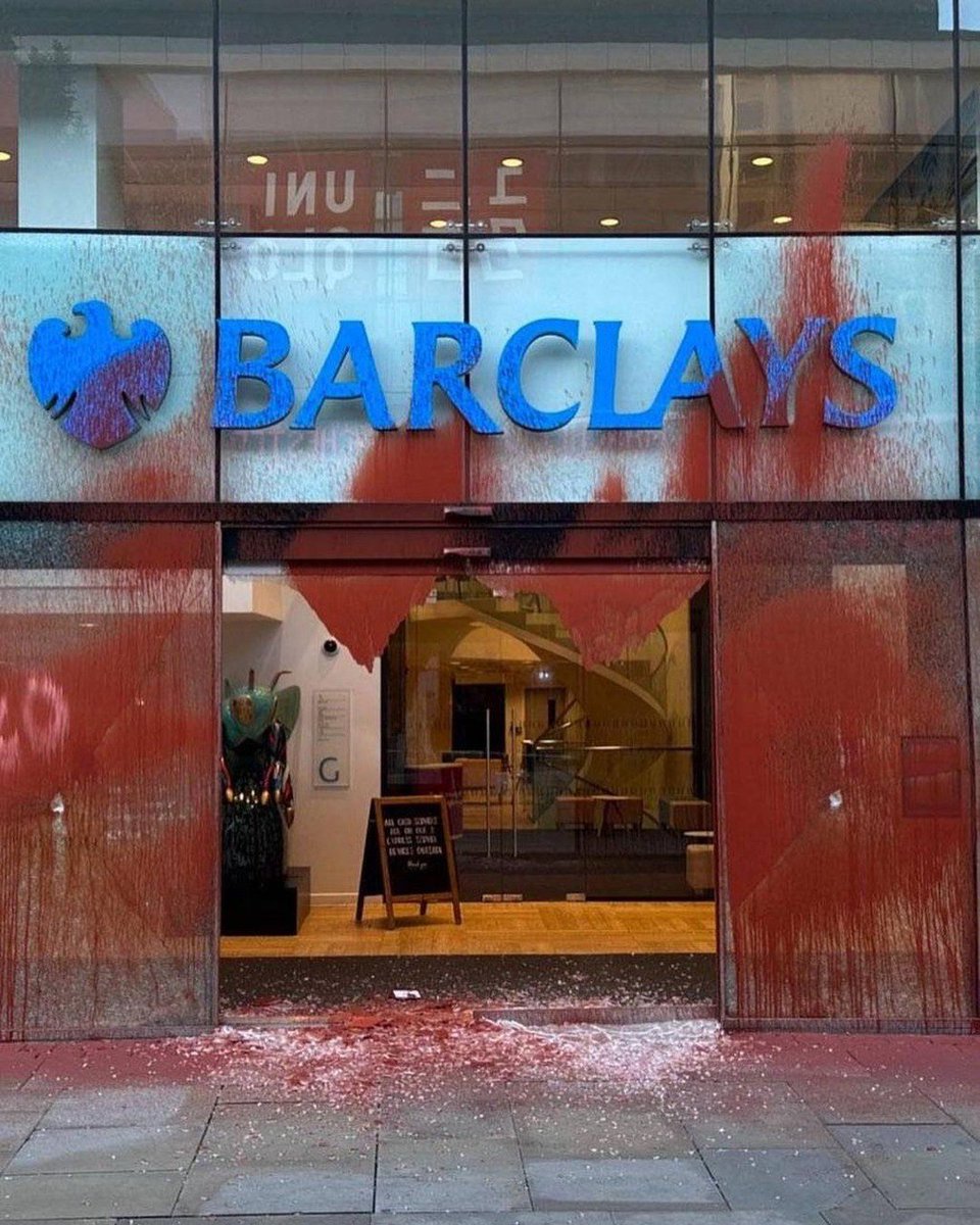 Palestine Action activists sprayed Barclays branches and BNY Mellon offices in Manchester with red paint to protest their complicity and investment in Israeli arms companies like Elbit Systems, Israel's largest weapons firm, which supplies drones and 
1/2
#AlleyesonRafah