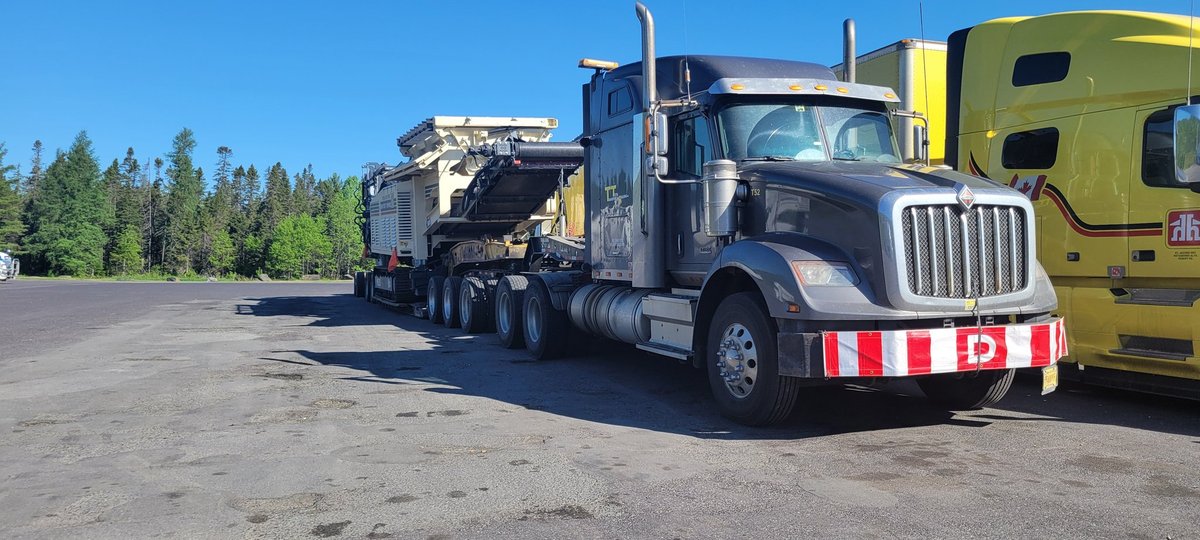 Awesome shot of our very own Andre, hauling a crusher from Halifax N.S. over to Oshawa, Ontario. Drive safely Andre. Happy Friday y'all! #totaltransportandrigging #heavyhauling #heavyhaulage #northamerica