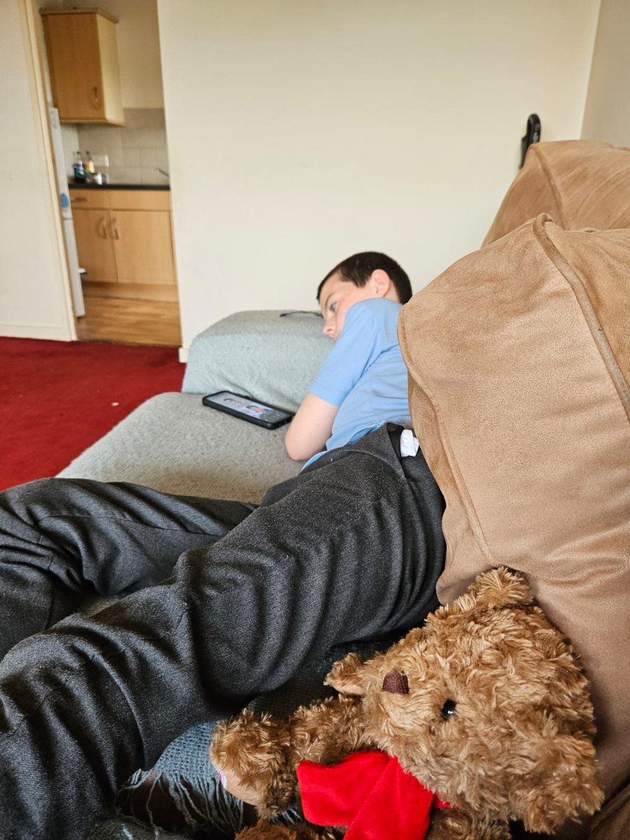 My poor wain sent home early from school and he's lying on Dad's couch not well 😟😟