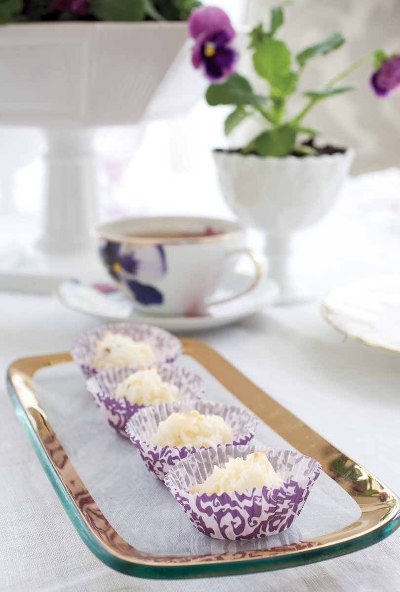 Celebrate National Macaroon Day with these delightful White Chocolate & Lavender Coconut Macaroons! A touch of lavender blends perfectly with white chocolate to create these gluten-free treats. Find the recipe at teatimemagazine.com/white-chocolat….