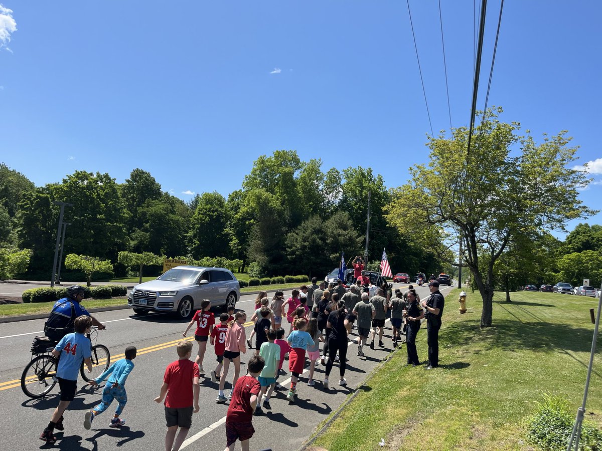 Monroe Elementary Unified Sports team joining the Monroe Police Department’s Torch Relay for Special Olympics!