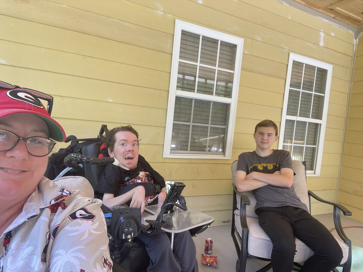 twmason's tweet photo. Watching with William and Gabe by the pool.  Sadly we couldn’t get tickets.:-(. Enjoying listening to @jeffdantzlertv and @djohnstonuga https://t.co/CVQ02qyU1D