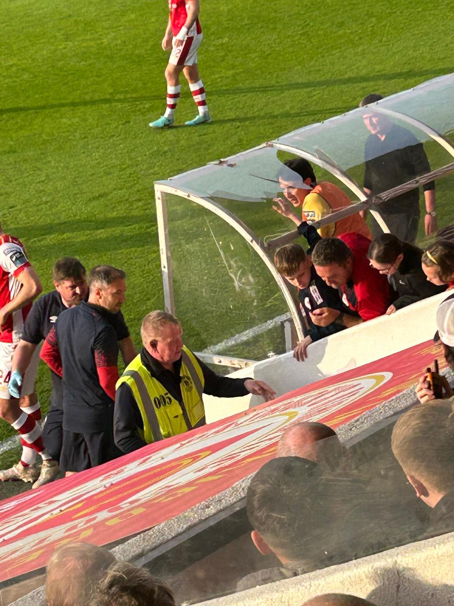 Galway United clearance lands on top of the Pat's dugout and smashes the top of it. Goalkeeping coach Pat Jennings had to go down the tunnel briefly for treatment as he was caught by a loose piece