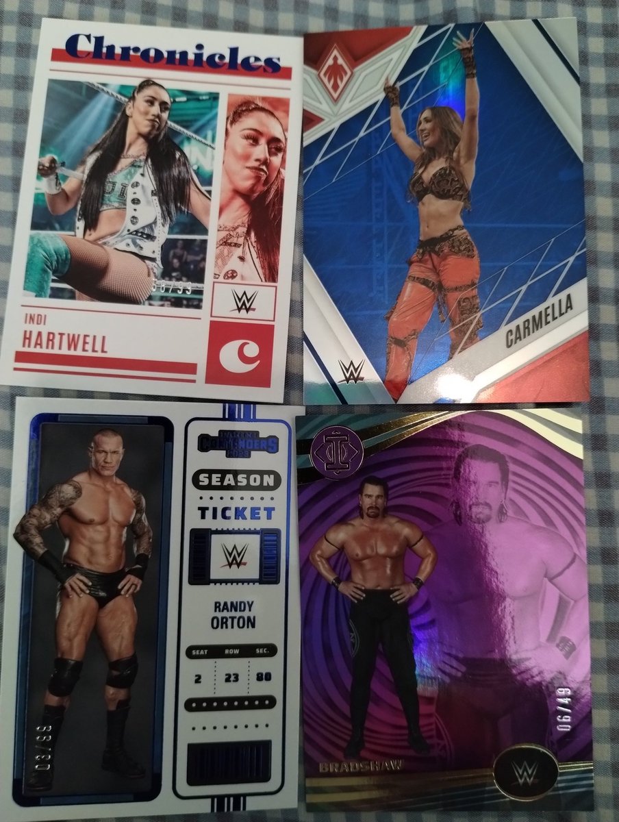RetroJDash's tweet photo. Well not bad. A lot of numbered cards. Red out of 199. Blue out of 99 a purple out of 49 and a gold? Out of 10. Plus my first ever redemption pull ever. Now to learn how to redeem. @CardPurchaser https://t.co/edW9iSQZY0
