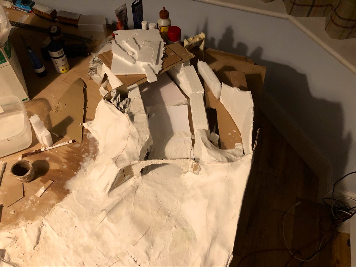 NWR_81's tweet photo. The hill/tunnel expands! The tunnel portal is now fixed in, next is to finish up the brick pattern on it and then build up the hill above the tunnel! https://t.co/4RlLJKxNp8