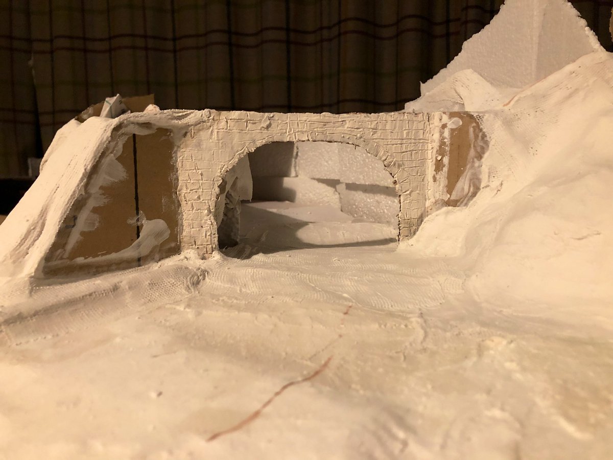 NWR_81's tweet photo. The hill/tunnel expands! The tunnel portal is now fixed in, next is to finish up the brick pattern on it and then build up the hill above the tunnel! https://t.co/4RlLJKxNp8