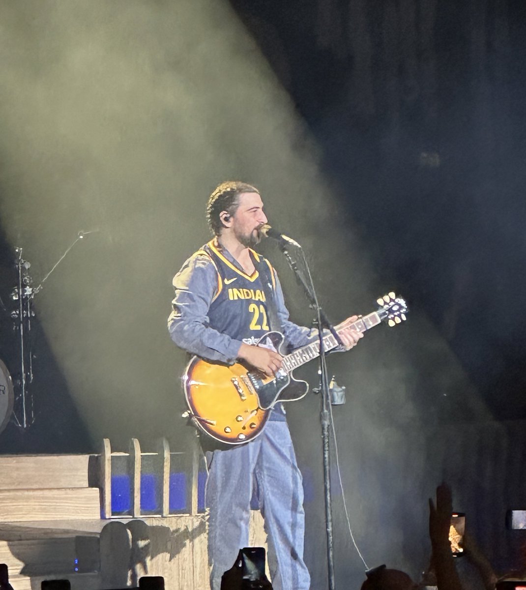 Tonight in Indy, <a href="/NoahKahan/">Noah Kahan</a> wearing a <a href="/CaitlinClark22/">Caitlin Clark</a> Fever jersey at his concert.