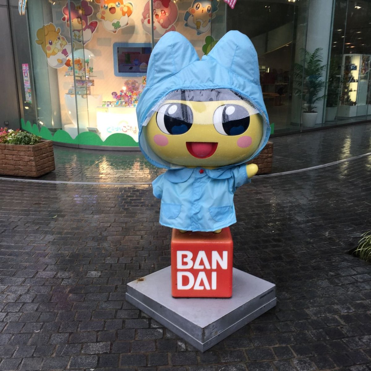 Thinking about how they put a little raincoat on the Mametchi statue for when it's raining