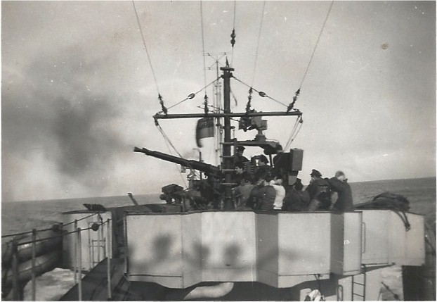 #OTD 20/5/1951 #RememberRCN -HMCS SIOUX bombards the city of P’ungch’on, Korea prior to the landing of a force of Royal Marines from HMS CEYLON. Photo -SIOUX firing Pom-Pom, courtesy For Posterity's Sake