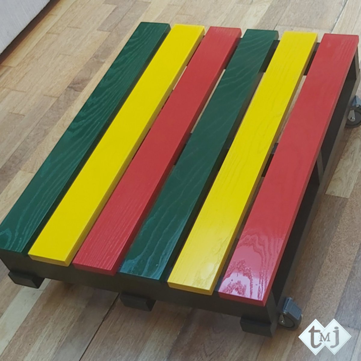 This unique table, featuring a pallet-inspired structure, rolls in style with wheels for added convenience. Coloured in bold red, yellow, and green hues, it brings lively and dynamic energy to your space.

#TMJDesigns #interiordesignersnearme #HomeDecor #designerfurnitures