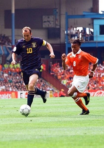 10 days to go: Gary McAllister

The skipper played in 9 out of 10 qualifiers & all three matches at Euro ‘96. Sadly remembered for THAT penalty at Wembley, but he still fronted up post match when it would’ve been understandable to hide.

#WeAreGoingToWembley