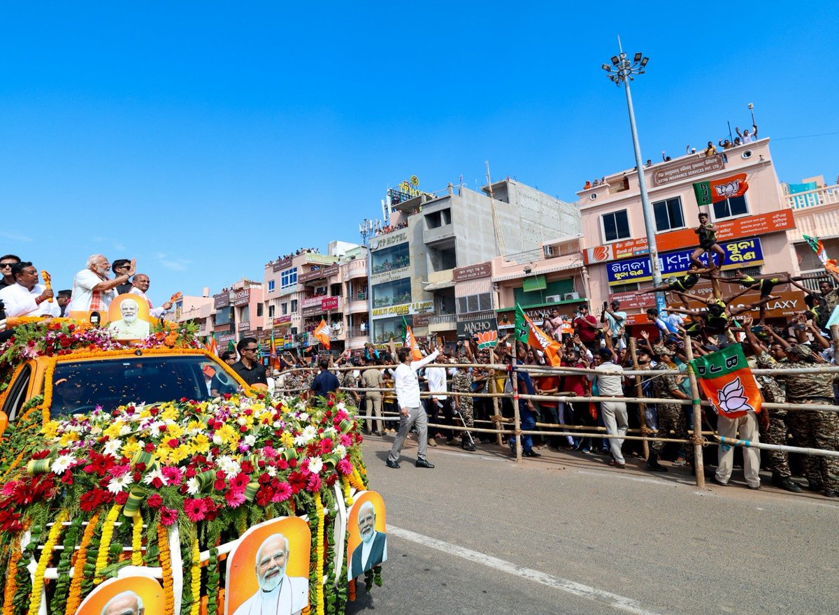 narendramodi's tweet image. Here are some glimpses from the roadshow in Puri.