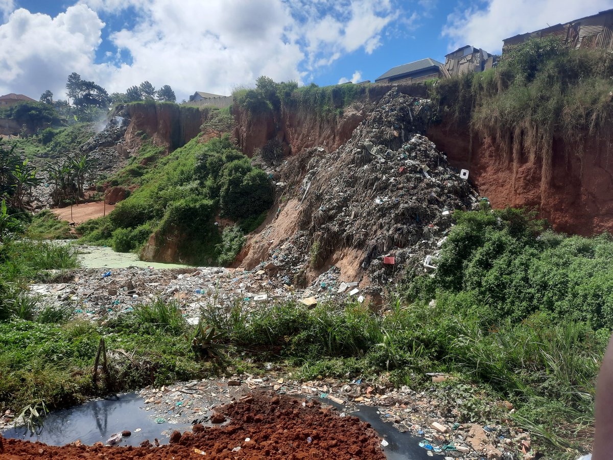 Polythene bags being dumped in a quarry. Polythene bags don't decompose and only just make up a cover up the soils making it impossible for anything to grow. Proper disposing of waste is needed to protect our mother nature
