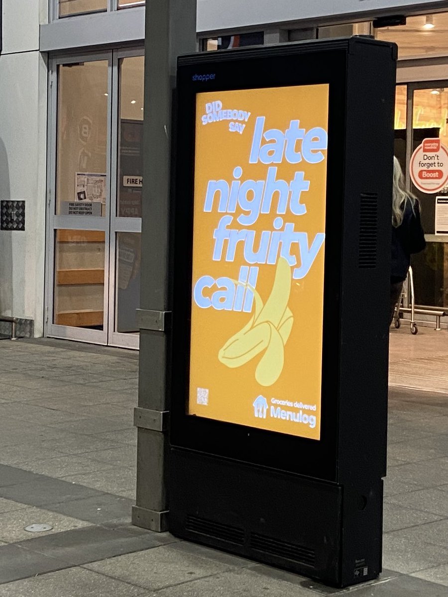 grindr ad outside Woolies